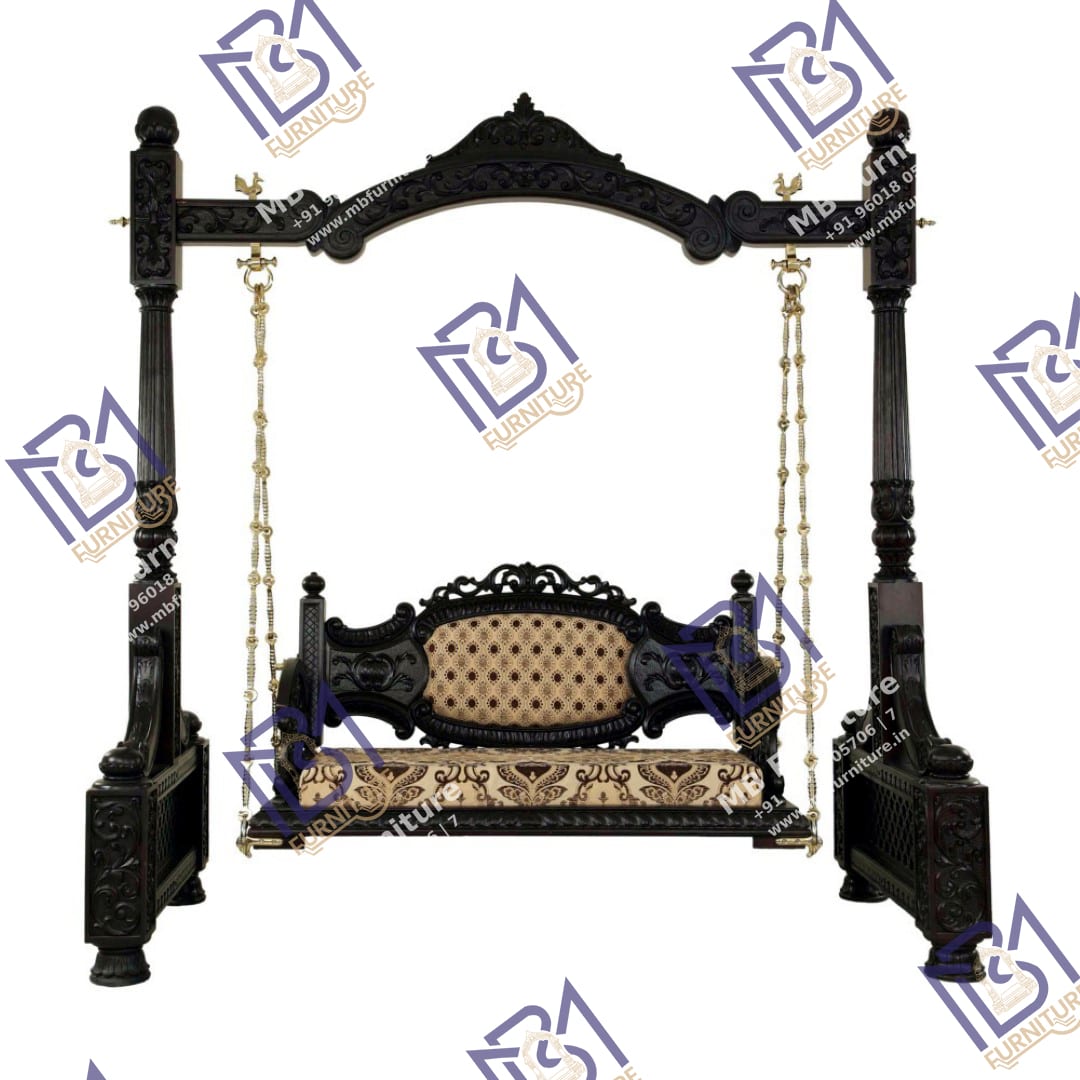 Brass chain suspension on a hand-carved heritage swing.
