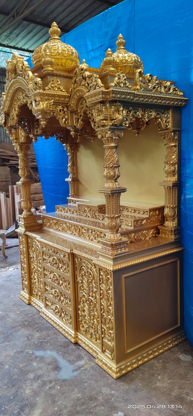A gold-lacquered sanctuary nearing completion in our workshop.