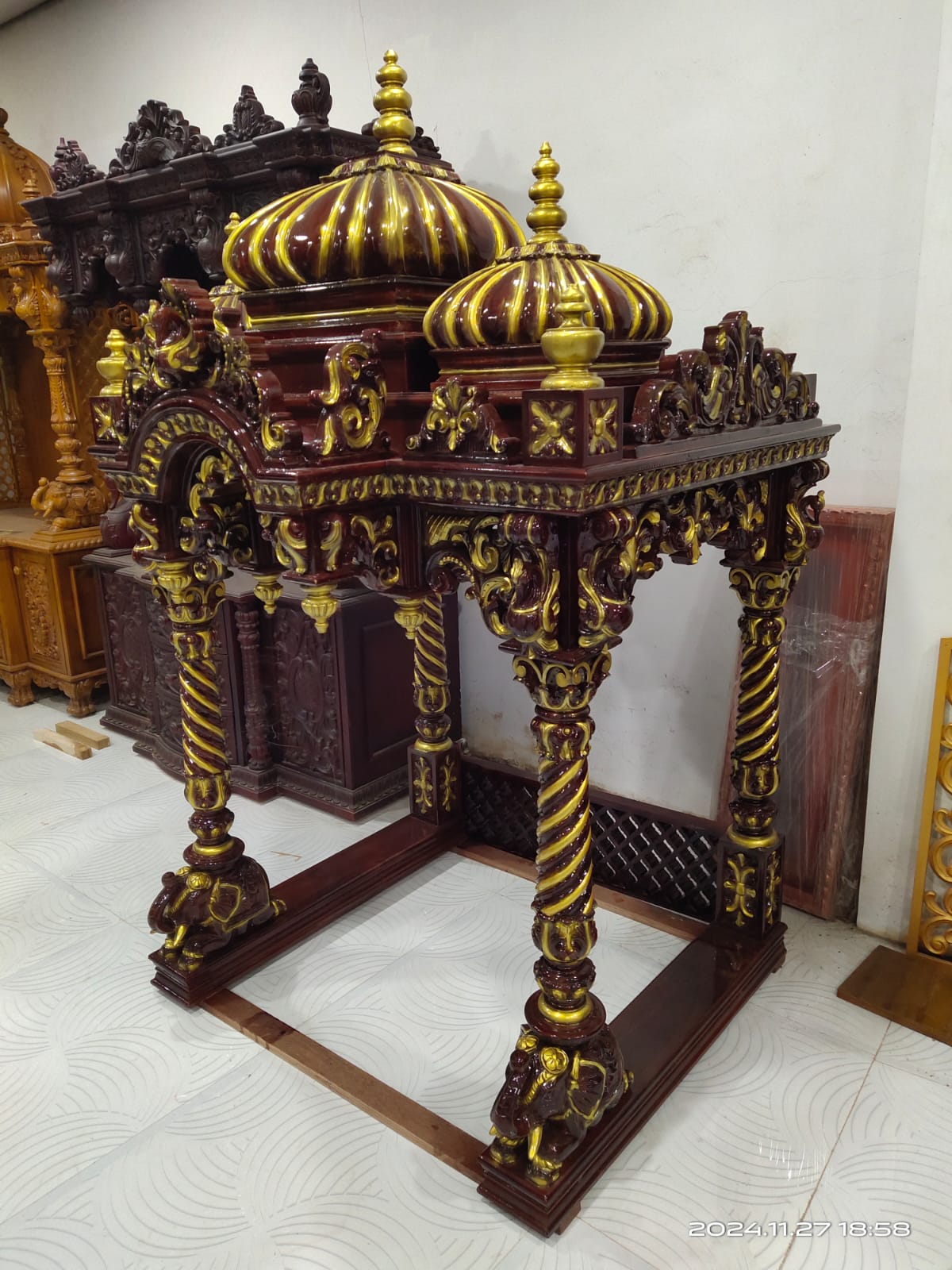 Every column hand-turned before gilding begins.