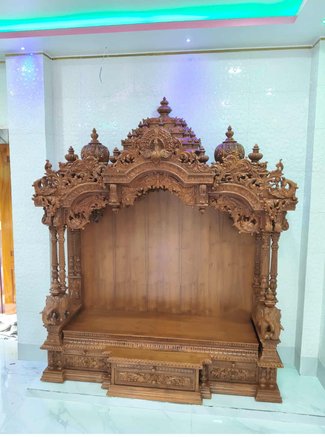 Layered gold-gilded carving on a grand sanctuary altar.
