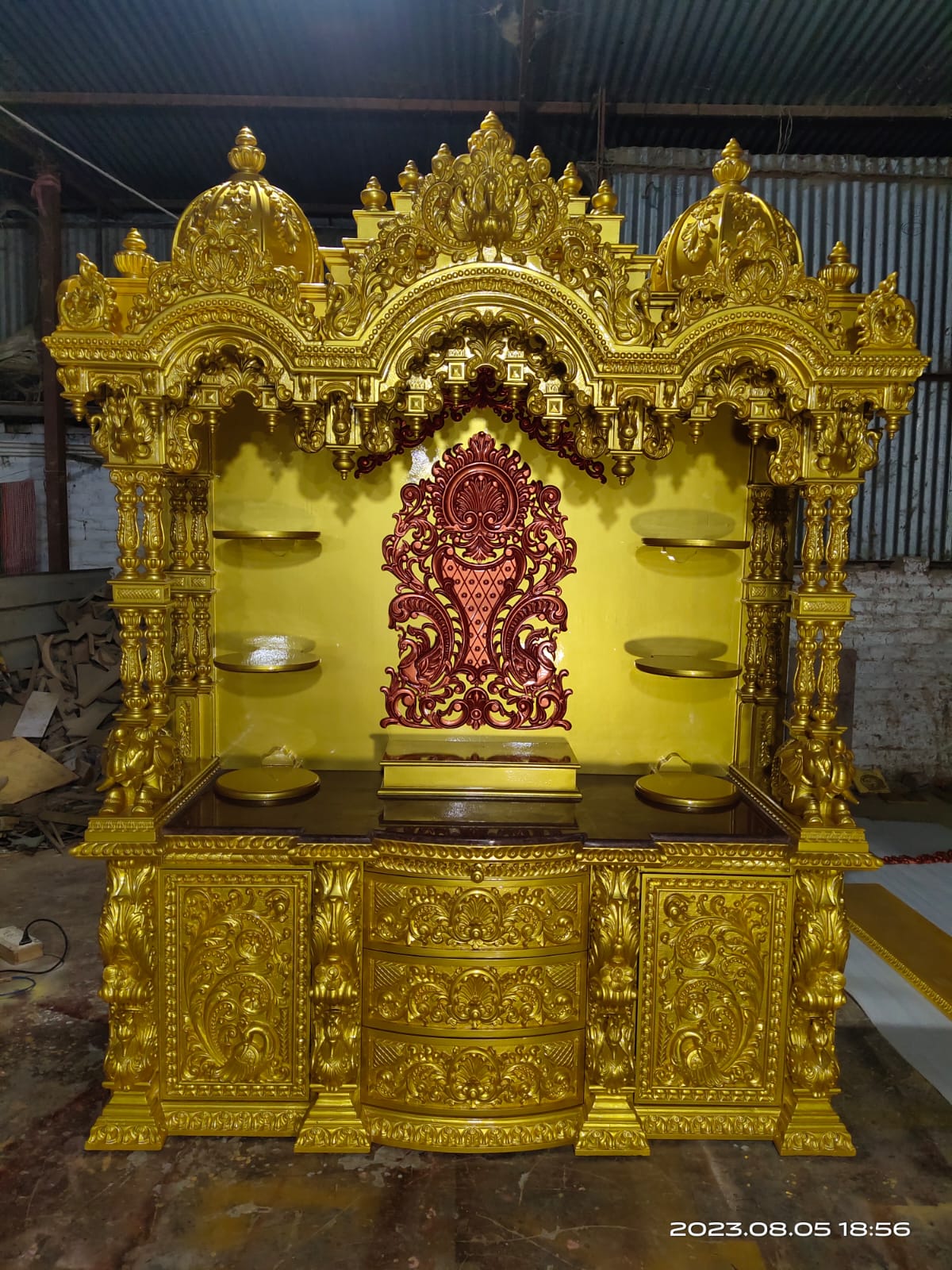 Hand-carved detailing on a large devotional altar.